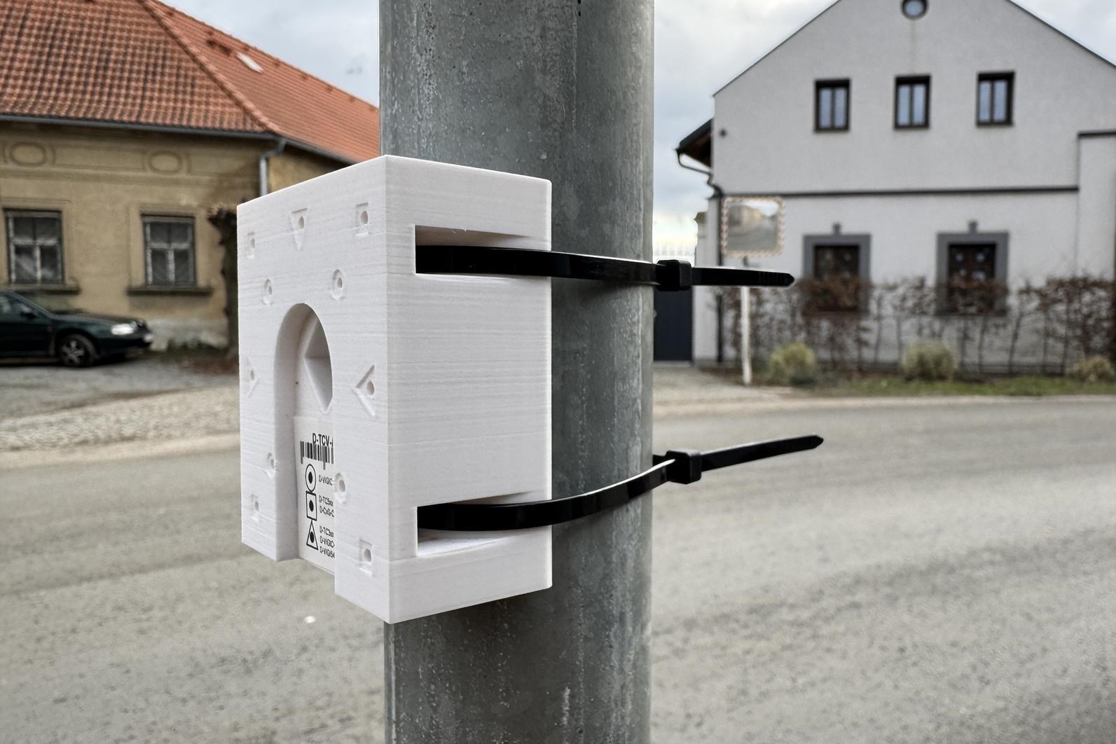 TP-LINK adaptér držáků kamer D-TC3XX-C, D-TC5XX-C, D-TC5XX-CL pro uchycení na sloup (60-130mm),  bílý s krytkou kabelů(1ks)8 