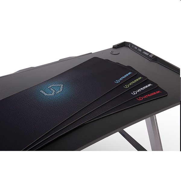 ULTRADESK Herný stôl RACER, 120X64 cm, 77 cm, RGB podsvietenie, so 4 XXL podložkami pod myš, s 2 hákmi pre slúchadlá 